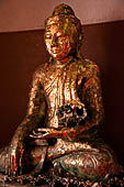 Ayutthaya, Thailand. Viharn Phra Mongkhon Bophit, Buddha heads covered in gold leaves.